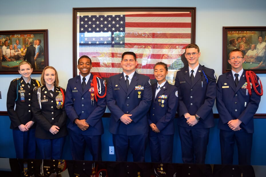 Cadets in front of flag