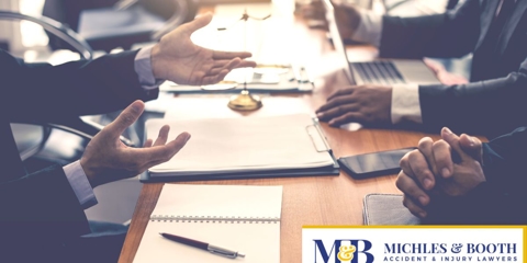 Three attorneys having a discussion