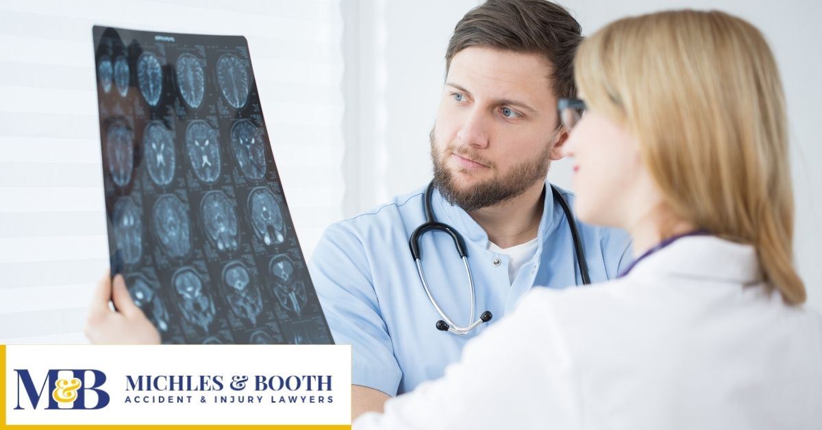 Doctors looking at brain MRI