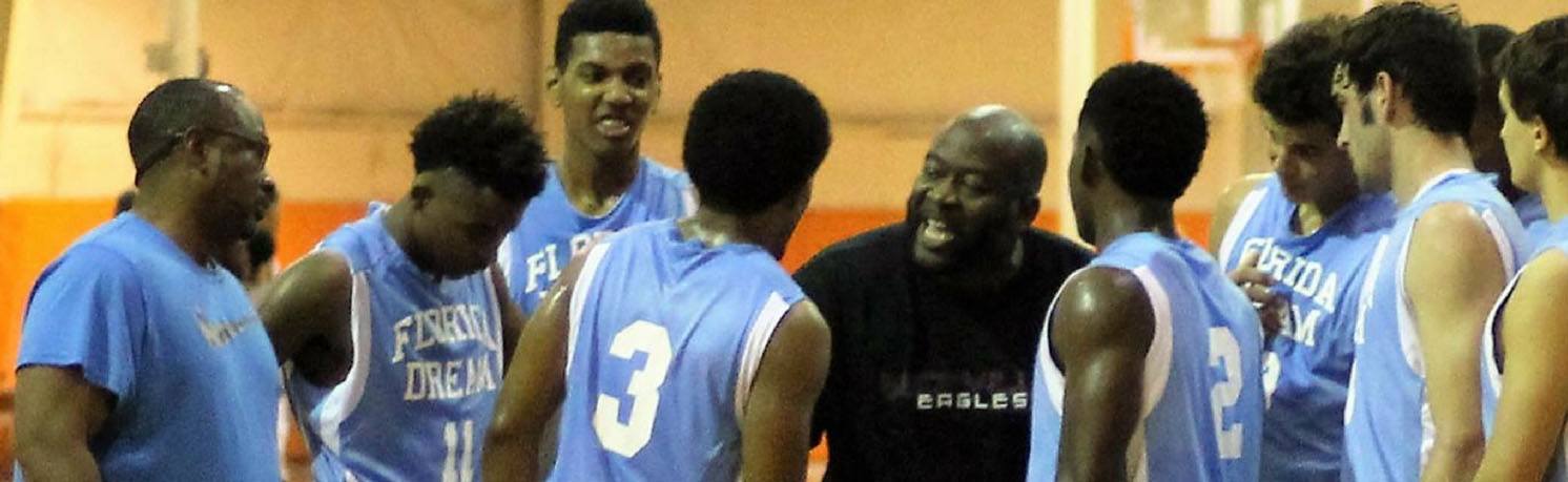 Image of coach and players