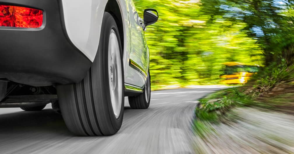 a car speeding around a turn